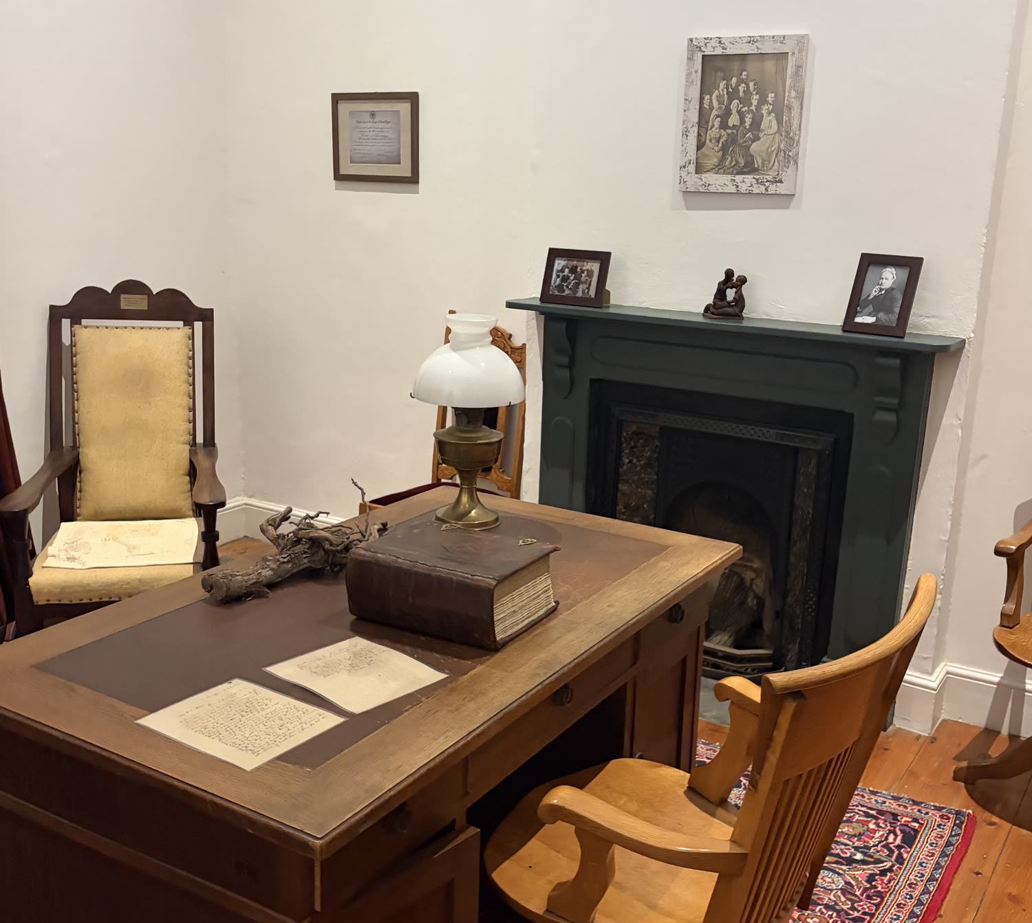 The high-backed chair beside Andrew Murray's desk, with his Bible and letters on the desk.
